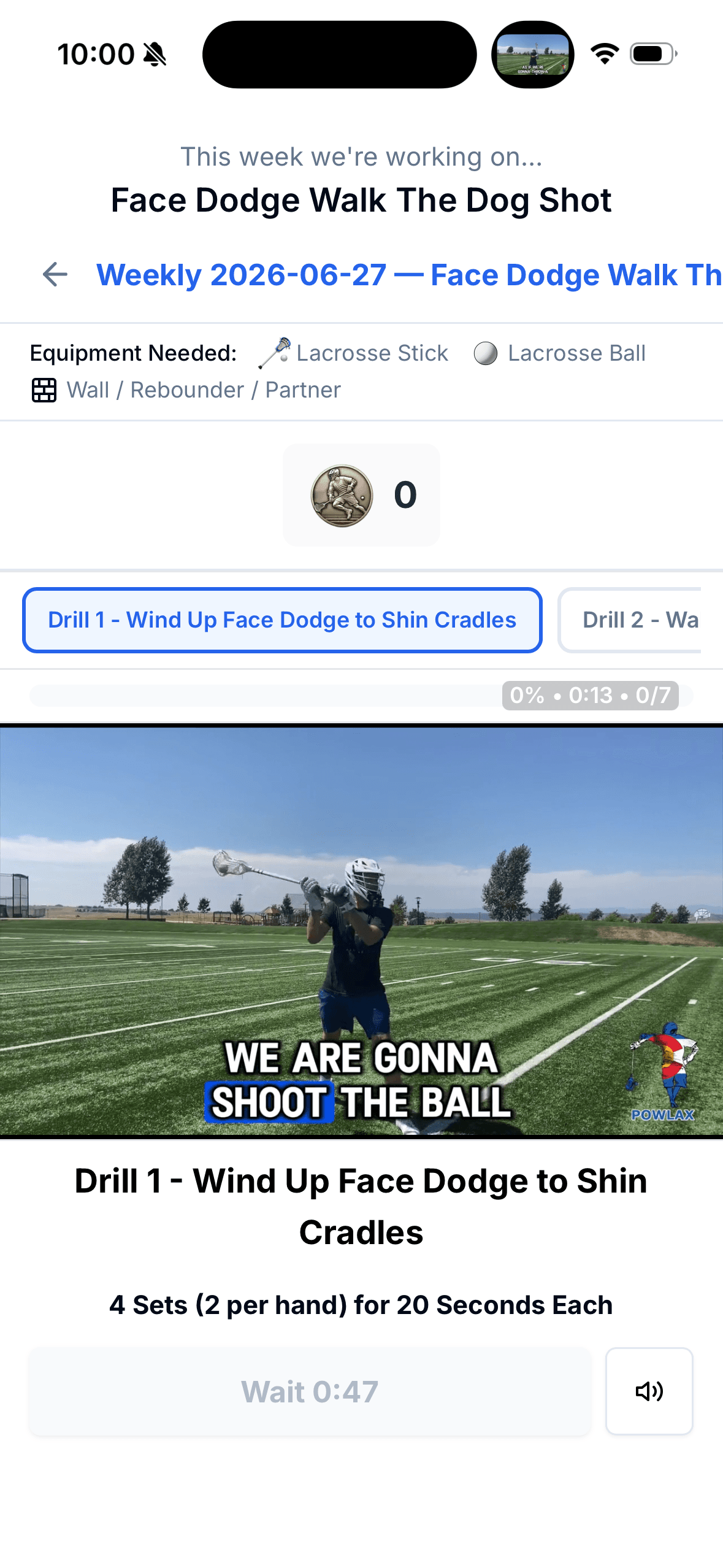 POWLAX Skills Academy weekly workout on a phone: Face Dodge Walk The Dog Shot, with the drill video playing and the equipment needed listed