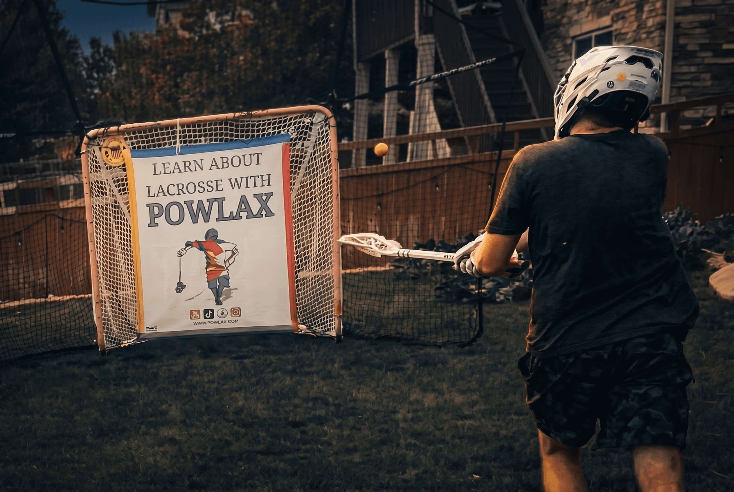 Lacrosse player running a backyard shooting workout in the POWLAX Skills Academy